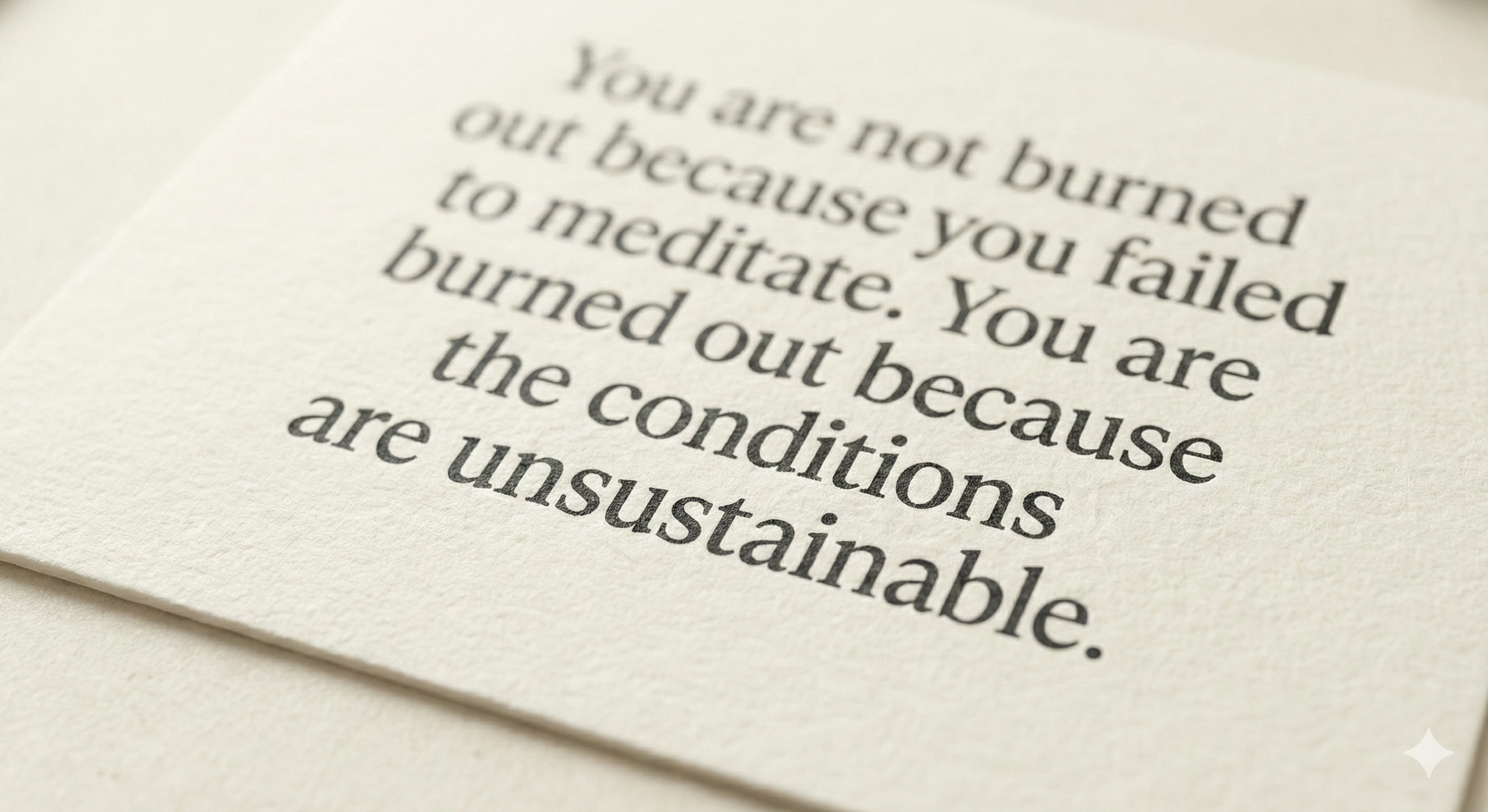 Close-up of a reminder card showing the text 'the conditions are unsustainable' on thick textured cream paper
